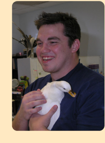 Photo: vet assistant with a duck