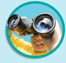 Photo: boy looking through binoculars