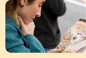 Photo: teacher looking at map